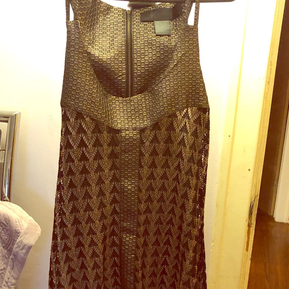 Kardashian’s Metallic Dress